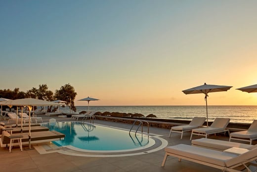 Costa Grand Resort & Spa - pool at sunset