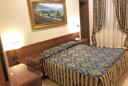 Mariano Hotel - bedroom