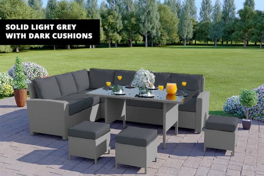9 Seater Rattan Wowcher Solid Light Grey Rattan Sofa With Cushions And Table Set Up On A Garden Patio